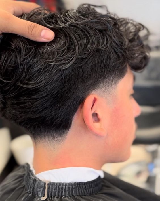 Mid Taper Fade with Long Hair